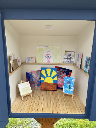 Mini gallery interior with artwork